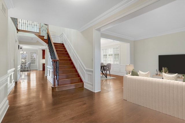 interior space with hardwood / wood-style flooring, a healthy amount of sunlight, and a chandelier