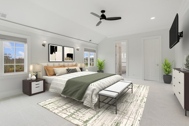 bedroom featuring vaulted ceiling, light carpet, connected bathroom, and ceiling fan