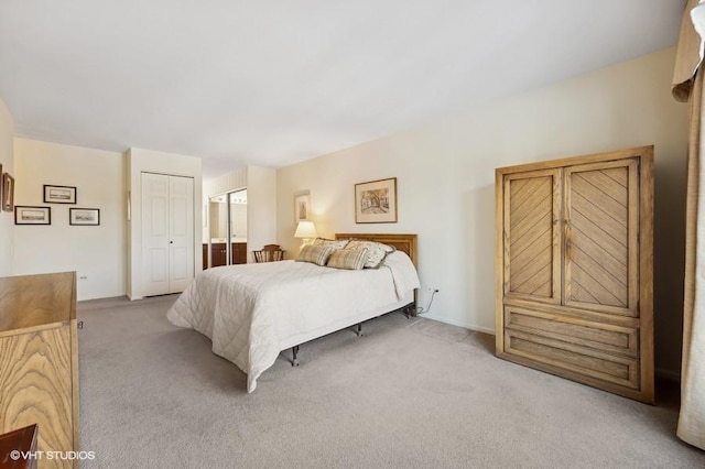 carpeted bedroom with a closet