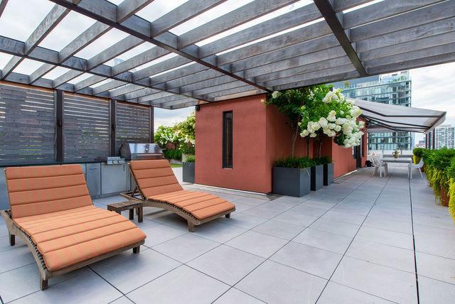 view of patio with an outdoor kitchen, a grill, and a pergola