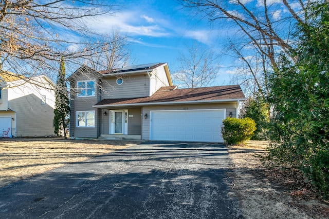 front facade with a garage