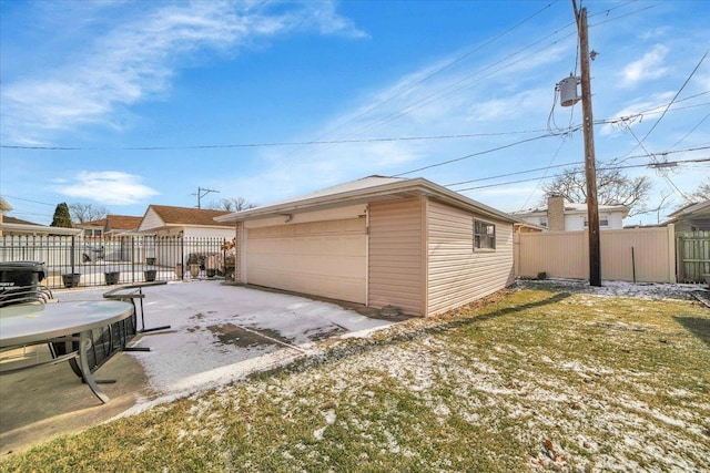 garage with a lawn