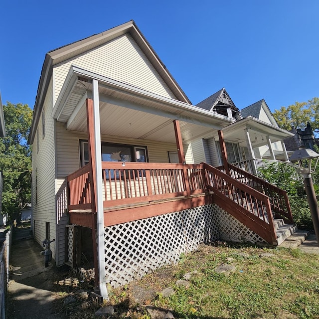 view of home's exterior with covered porch