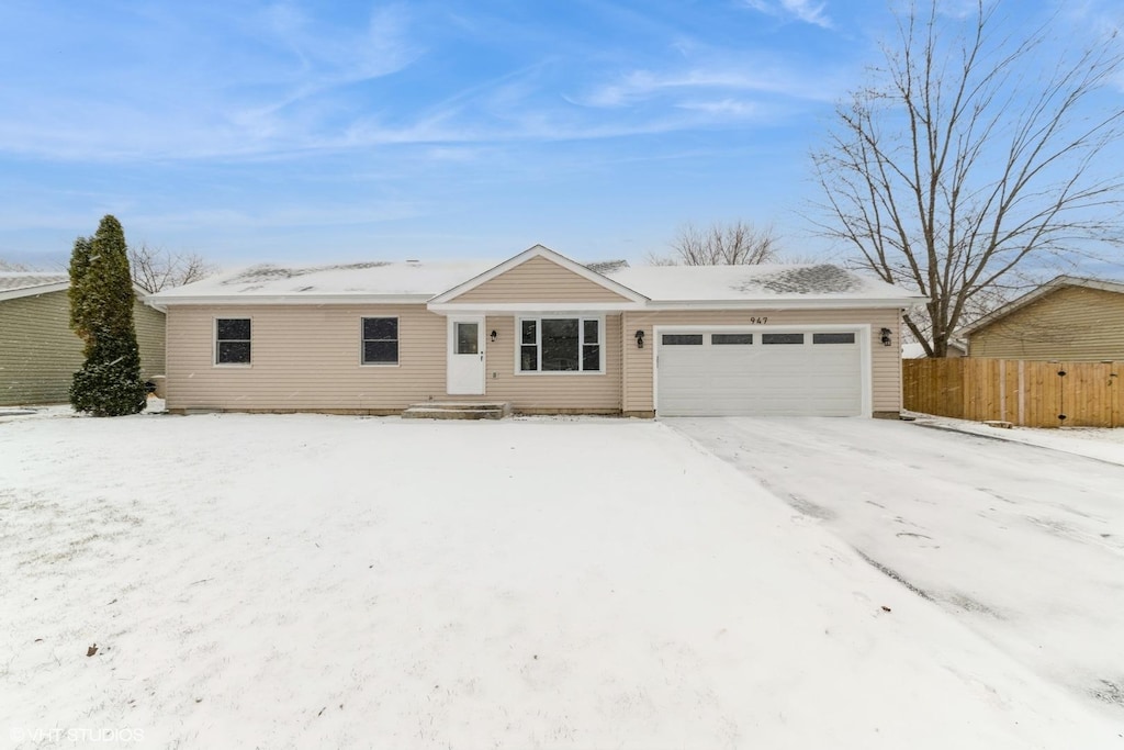 ranch-style house with a garage