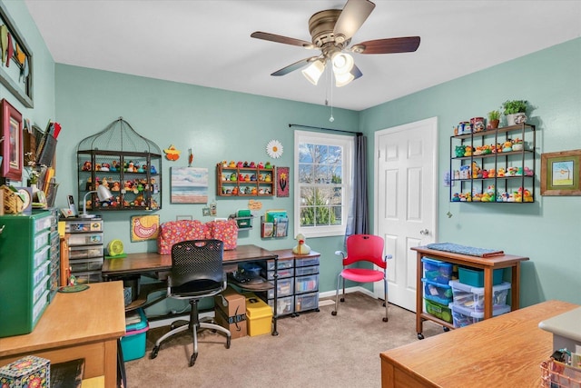 home office featuring ceiling fan and carpet floors