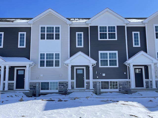 view of front of property featuring stone siding