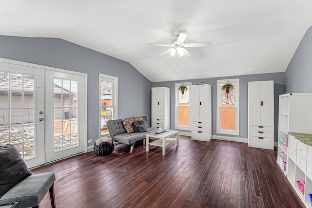 sitting room with dark hardwood / wood-style flooring, vaulted ceiling, french doors, and ceiling fan