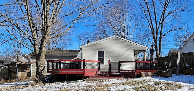 view of front facade with a wooden deck