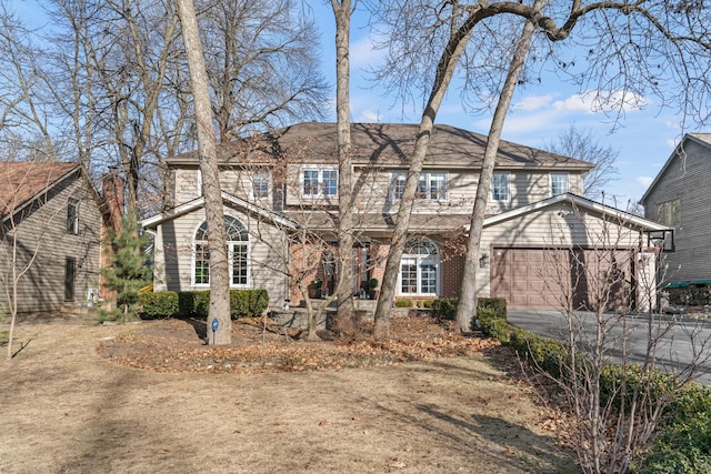 view of front of property with a garage