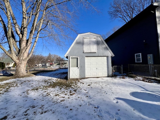 view of snow covered garage