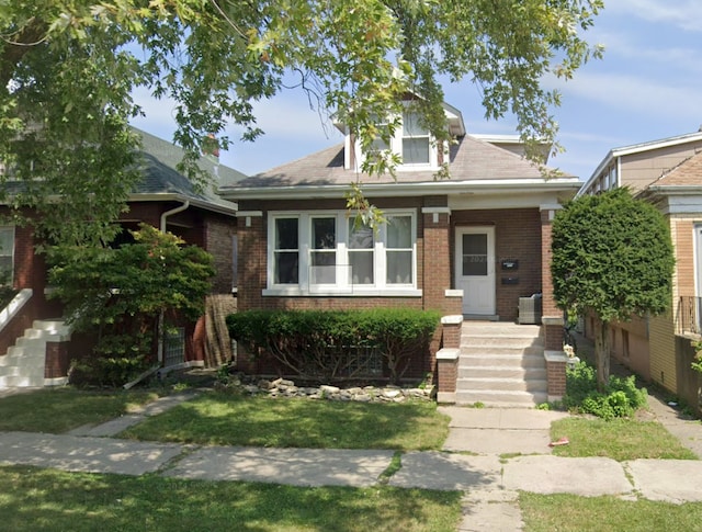 view of front of house with a front yard