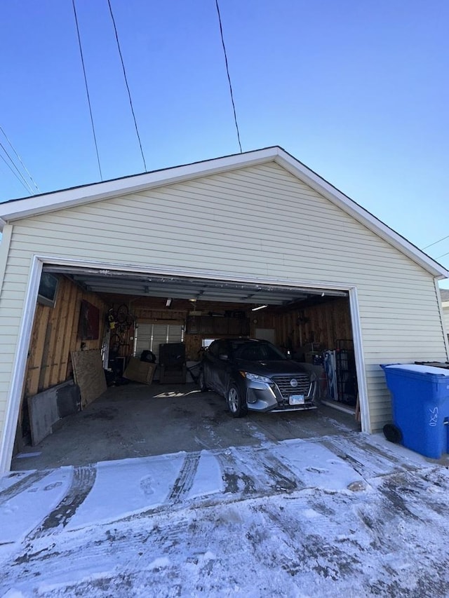 view of snow covered garage