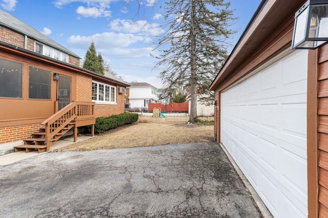 view of yard featuring a garage