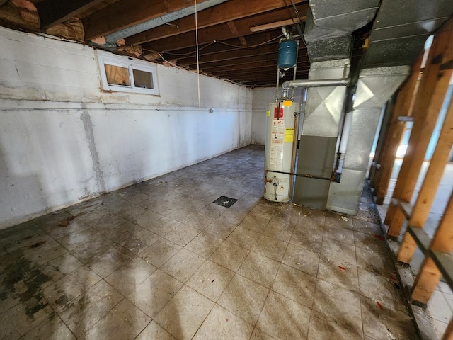 basement featuring water heater