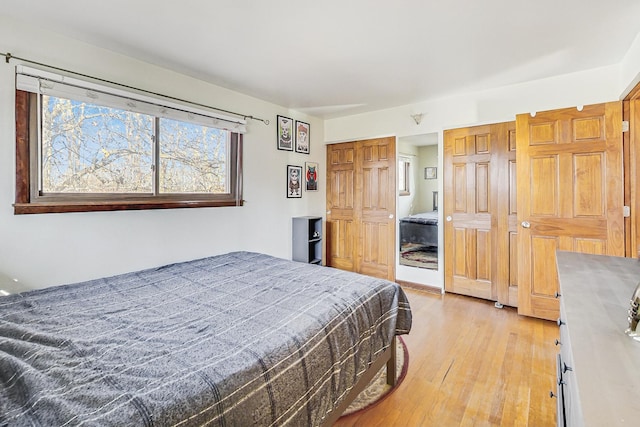 bedroom with light wood-type flooring