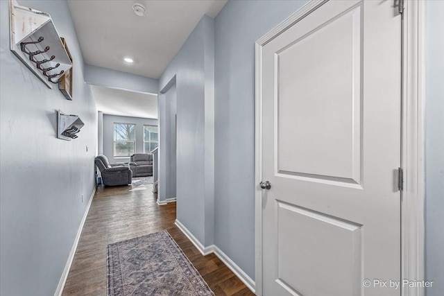 corridor with dark wood-type flooring