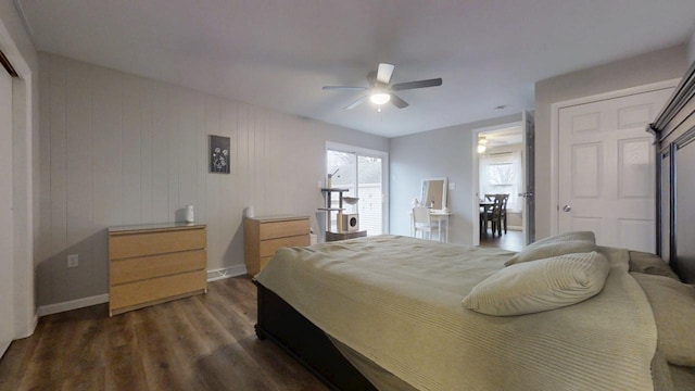 bedroom featuring dark hardwood / wood-style floors and ceiling fan