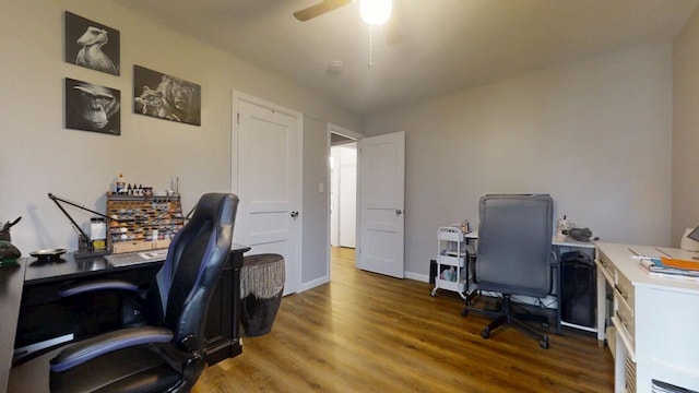 office with ceiling fan and dark hardwood / wood-style floors