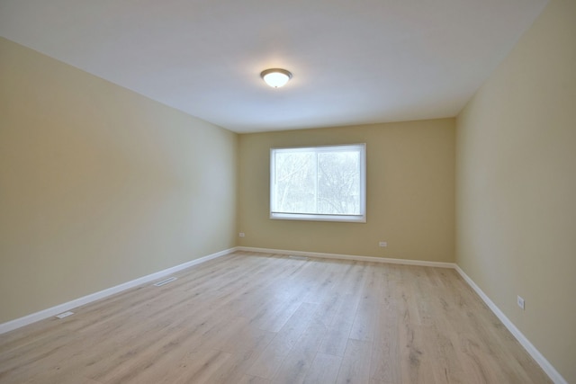 empty room featuring light hardwood / wood-style floors