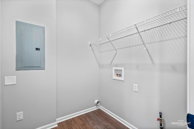 laundry area featuring washer hookup, dark hardwood / wood-style floors, and electric panel