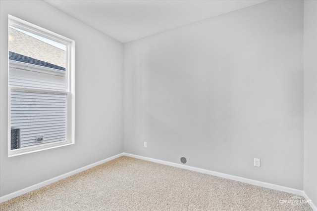 view of carpeted spare room