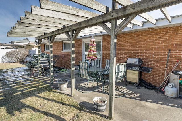 view of patio with a pergola and grilling area