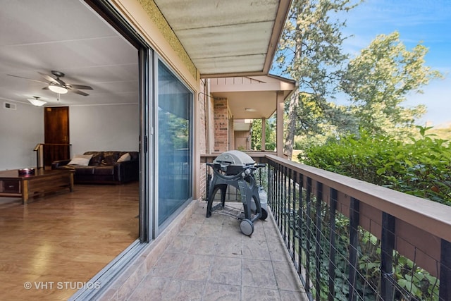 balcony featuring ceiling fan