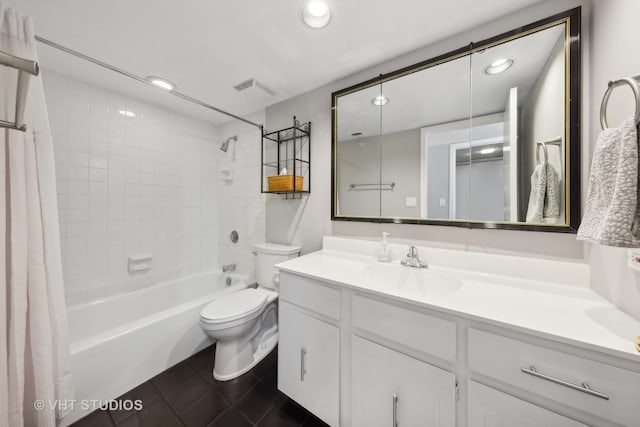 full bathroom featuring tile patterned flooring, vanity, shower / tub combo, and toilet