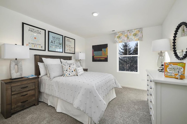 bedroom with light colored carpet