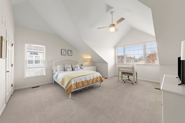 bedroom with baseboards, visible vents, light colored carpet, lofted ceiling, and ceiling fan