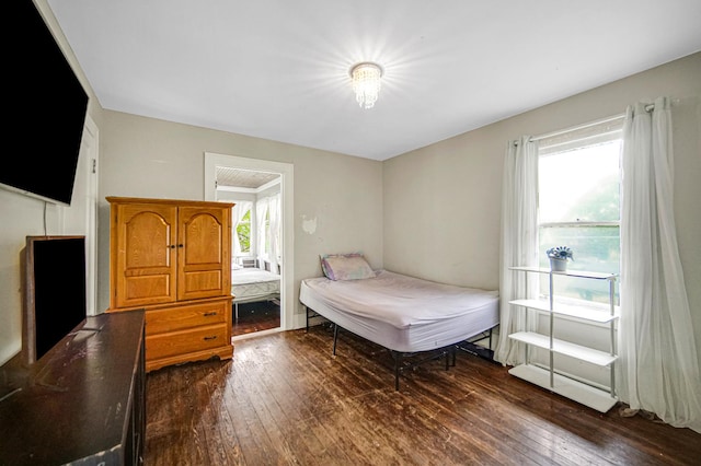 bedroom featuring dark wood-type flooring