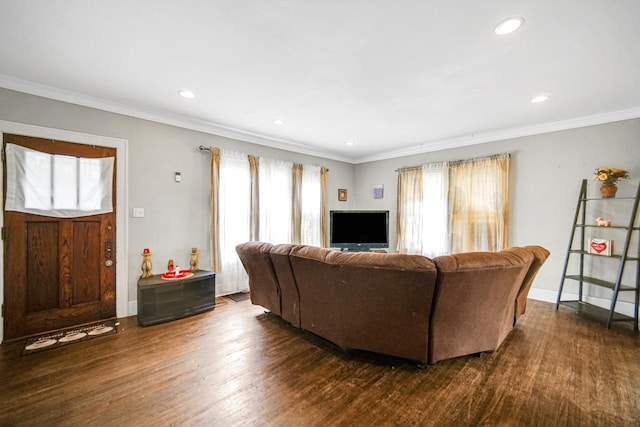 living room featuring recessed lighting, ornamental molding, and dark wood-style floors