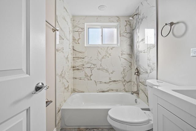 full bathroom featuring vanity, toilet, and tiled shower / bath combo