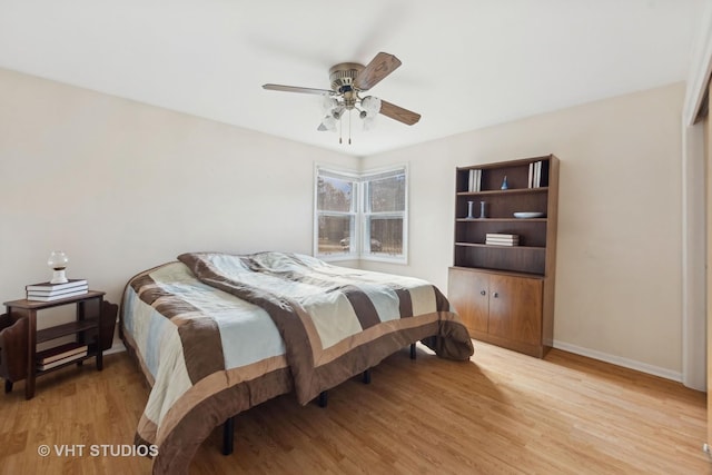 bedroom featuring ceiling fan and light wood-type flooring