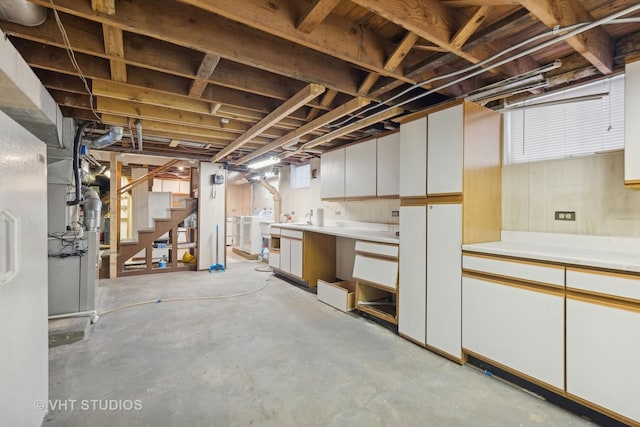 basement with independent washer and dryer