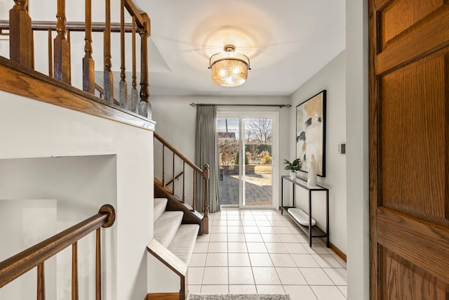 entryway with light tile patterned floors