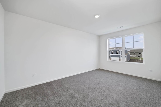 unfurnished room with carpet