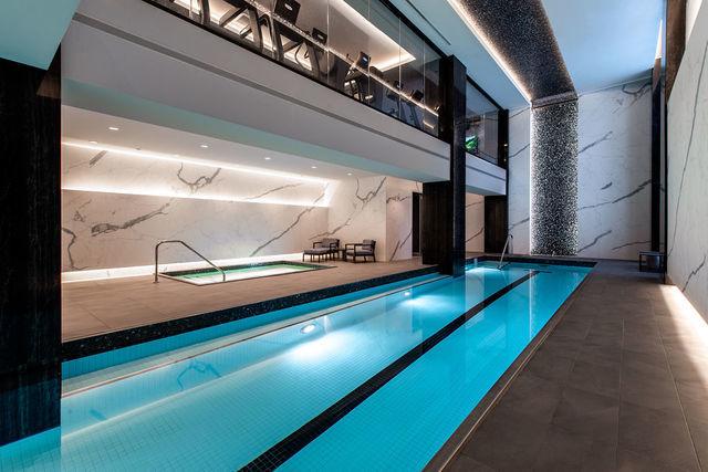 view of swimming pool featuring an indoor in ground hot tub