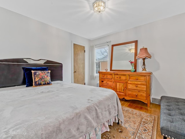 bedroom featuring light hardwood / wood-style floors