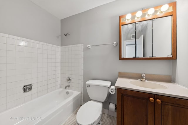 full bathroom featuring tile patterned flooring, vanity, bathing tub / shower combination, and toilet