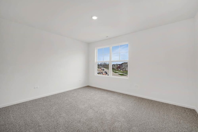 view of carpeted spare room