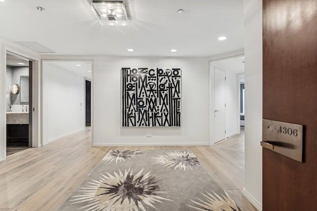 hallway featuring light wood-type flooring