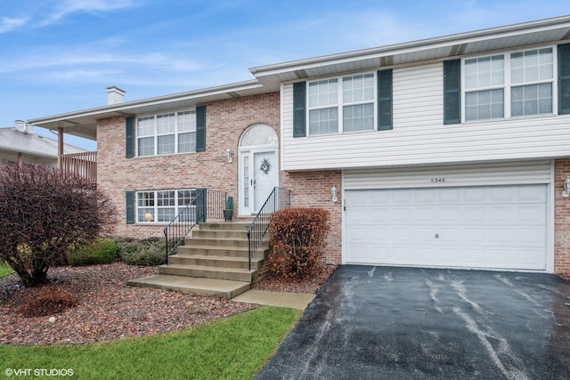 bi-level home with a garage