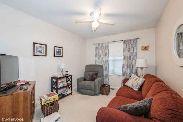 living room with light colored carpet and ceiling fan