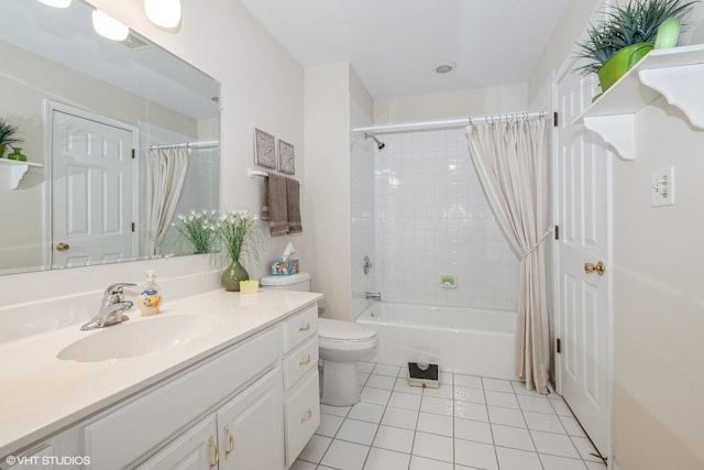 full bathroom with tile patterned floors, toilet, vanity, and shower / bath combo