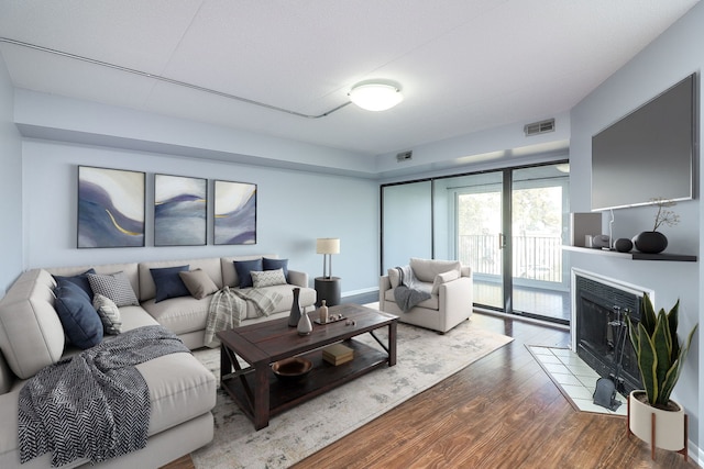 living room with hardwood / wood-style flooring