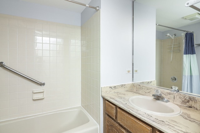 bathroom with vanity and shower / bath combination with curtain