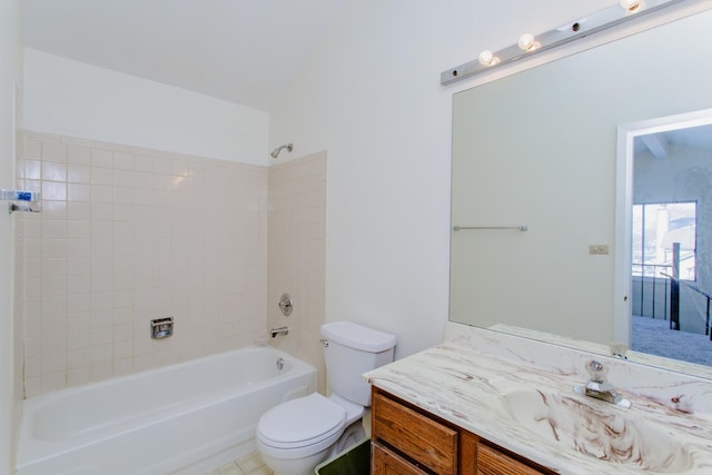 full bathroom with tiled shower / bath combo, vanity, and toilet