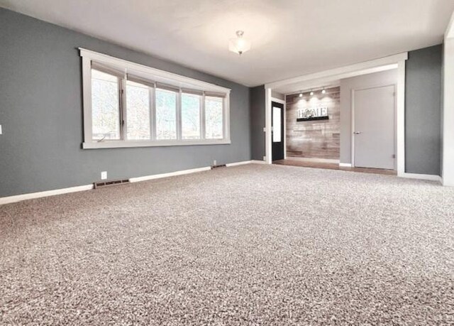 interior space featuring visible vents and baseboards