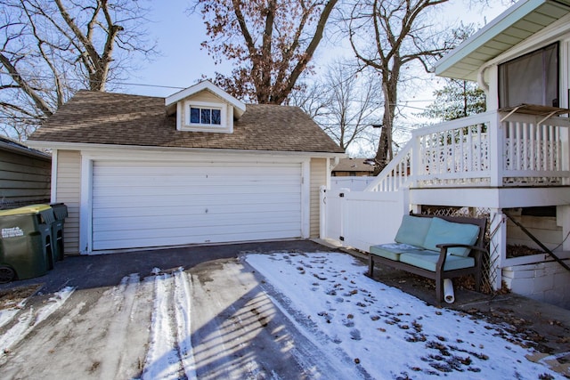 view of snow covered garage